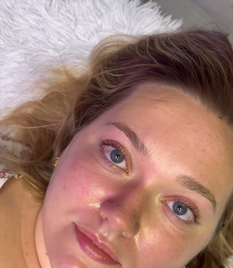 Client with freshly lifted lashes and shaped brows